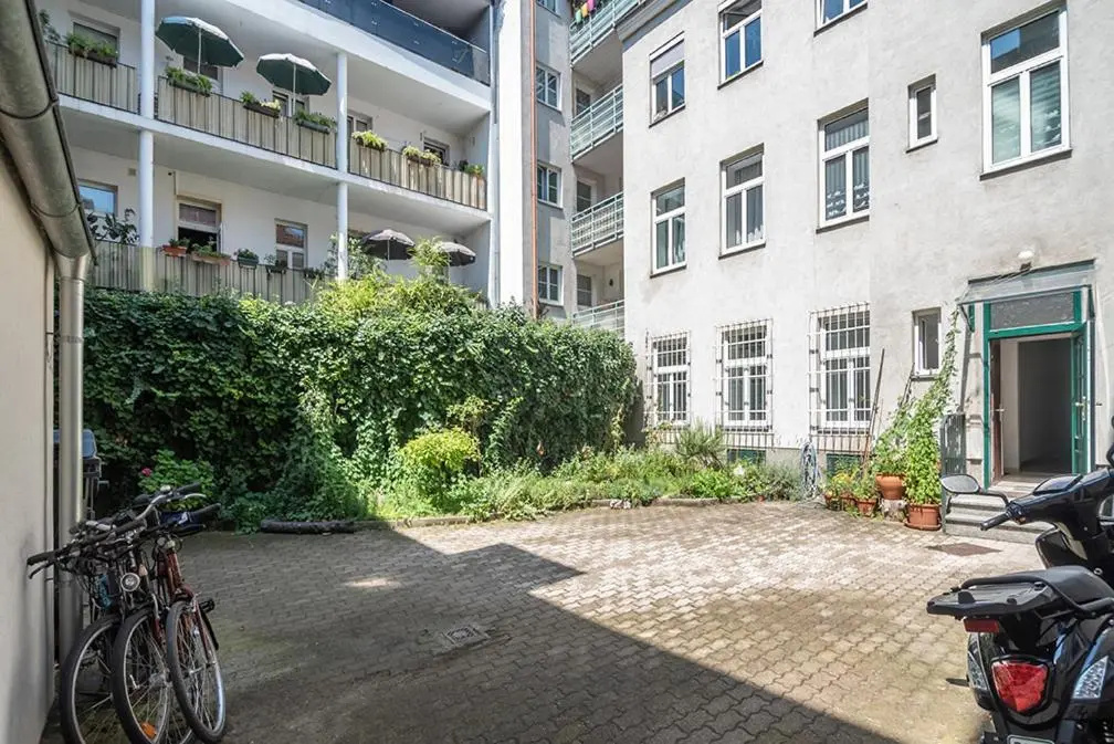 Colorful Apartment Facing Green Courtyard